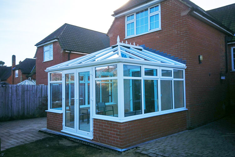 hite PVC Edwardian with solar control self cleaning glass roof & French doors