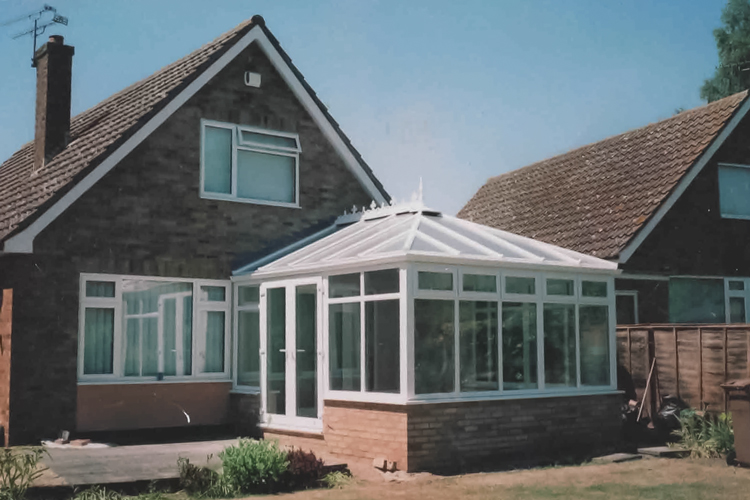 Edwardian Dwarf wall Conservatory with Polycarbonate roof and French doors to the left side