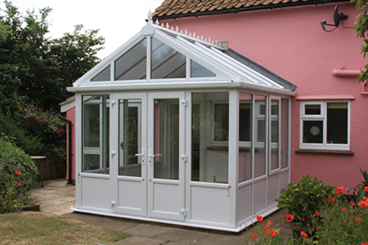 White PVCu Georgian Gable Conservatory with Opal polycarbonate roof, white PVCu insulating panels