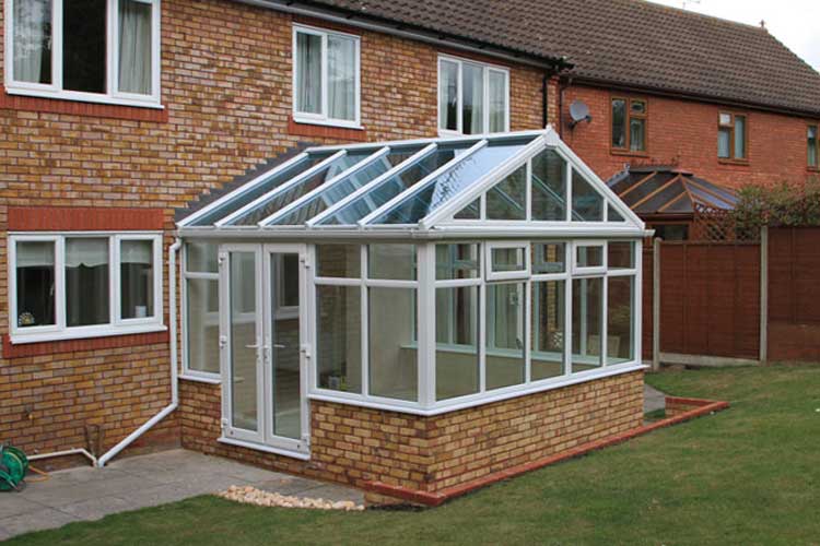 White PVCu Georgian Gable Conservatory with Solar control self cleaning roof