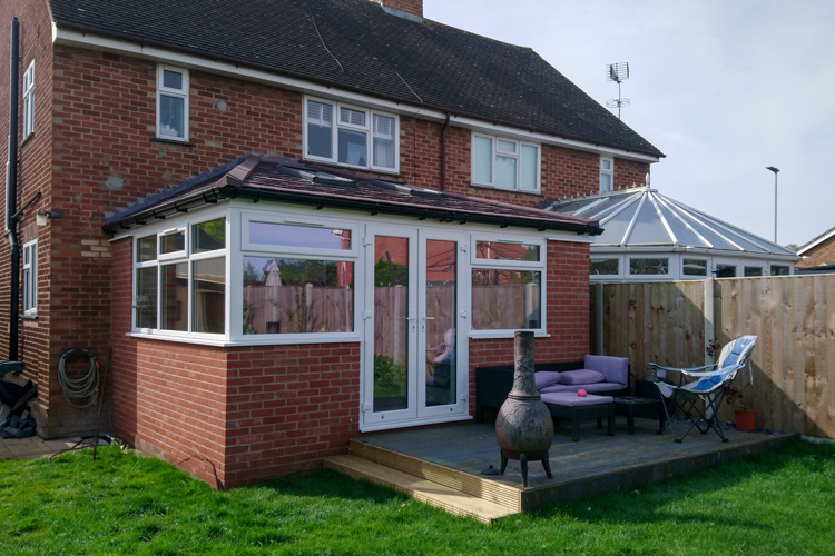 Hipped Lean-To solid roof extension with Metrotile Charcoal Tile