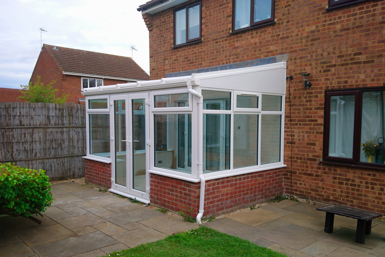 White PVCu Lean-To Conservatory with solar control self cleaning glass Roof