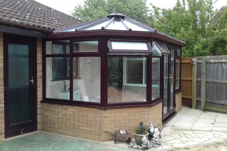 Rose wood/white PVCu Double hip Victorian Conservatory, solar control glass roof